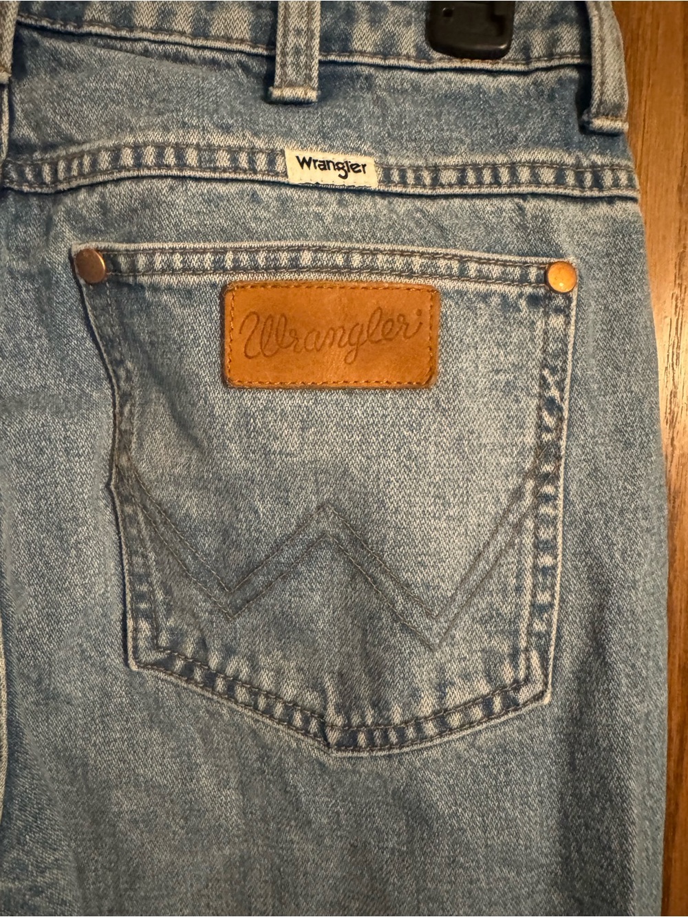 Wrangler Men's Medium Light Blue Relaxed Fit Jeans with Leather Patch